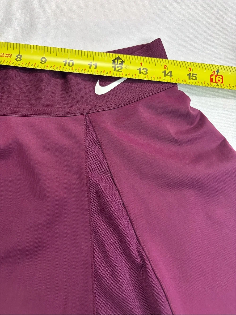 Nike Women's Plum Athletic Skater Skort with White Swoosh Accent